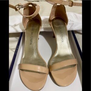 Stuart Weitzman - Nunaked Nude Sandal, Mid-Heel Patent Leather
